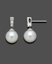 Simple enough to be worn every day, but glamorous enough to always create a statement. Belle de Mer's timeless drop earrings highlight a cultured freshwater pearl (9-10mm) with sparkling, round-cut diamonds (1/4 ct. t.w.) decorating a 14k white gold post setting. Approximate drop: 9/10 inch.