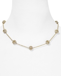 Gleaming crystal stations are oh-so graceful on this Lauren Ralph Lauren necklace, styled against a gleaming link chain.