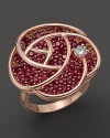 Set in 14K rose gold, this pink sapphire blossom is dewed with a diamond.