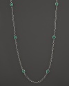 Faceted crystal and malachite are chicly framed by sterling silver Caviar™ beading and fluted oval links.