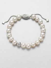 From the Spiritual Bead Collection. Luminous white freshwater pearls on a sterling silver box chain with sterling silver cabled bead accents. 8mm white freshwater pearlsSterling silverDiameter, about 7.75 adjustableBead closureImported 