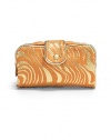 THE LOOKZebra-inspired metallic swirls on canvasPetite rectangular silhouetteSnap tab closure with signature goldtone S studUnfolds to reveal two clear zip pocketsInside removable zip pouchTHE MEASUREMENT7¼W X 3¼H X 2DTHE MATERIALCanvasFully linedORIGINImported