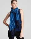 Rippling with a vibrant crush of color, this Eileen Fisher scarf elevates everyday basics.