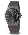 A strong design and a comfortable fit. This Skagen Denmark watch features a titanium-plated stainless steel mesh bracelet and lightweight round case. Charcoal dial with tonal luminous numerals, date window and logo. Quartz movement. Water resistant to 30 meters. Limited lifetime warranty.