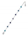 Saturated shades of blue, turquoise and purple complement one another beautifully on Swarovski's Pointiage bracelet. Set in silver tone mixed metal, it features a stylish series of spherical shapes. Approximate length: 6-1/2 inches.