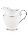 Beautiful and bridal-inspired, this white creamer is richly textured with a delicate floral motif and raised, beaded accents. Finished with a band of polished platinum.