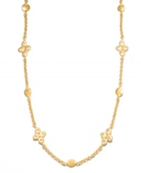 Rich, luxurious layers that can be worn long or doubled up. This chic Lauren Ralph Lauren necklace features intricate hammered discs in worn gold tone mixed metal. Approximate length: 60 inches.