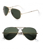 Classic metal aviator sunglasses fold to fit into your pocket. Available in gold with green crystal lens.Metal temples100% UV protectionMade in Italy 