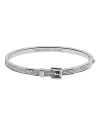 This dainty Michael Kors bracelet is the perfect piece to layer into an armful of bangles. The steel band features pave detailing and the center showcases a tiny buckle detail that's the perfect mix of cute and cool.