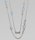 From the Infinity Collection. A long delicate sterling silver strand is accented with blue topaz stones.Blue topaz Sterling silver Length, about 46 Toggle clasp Imported