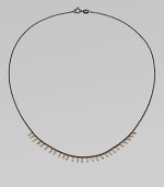 A delicate design with 14k gold beads on oxidized sterling silver chain. 14k gold beadsOxidized sterling silverLength, about 16Spring ring closureMade in USA 