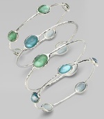 From the Silver Wonderland Collection. Faceted ovals of quartz in soft denim blue are backed by discs of mother-of-pearl and set in a graceful bangle of hammered sterling silver. Quartz and mother-of-pearl Sterling silver Diameter, about 2¾ ImportedPlease note: Bracelets sold separately. 