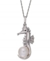 Aquatic elegance. This seahorse pendant, set in sterling silver, is adorned with a cultured freshwater pearl (8-1/2-9 mm) and single-cut diamonds (1/4 ct. t.w.) for a glamorous touch. Approximate length: 18 inches. Approximate drop: 1-1/2 inches.