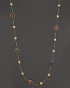 Mixed sapphires in colorful hues adorn this hand-engraved yellow gold station necklace from Marco Bicego.