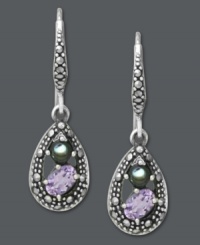 A true reflection of beauty. Genevieve & Grace's teardrop-shaped earrings combine a lovely mix of amethyst (3/4 ct. t.w.), abalone and marcasite for a sweet, sparkling mix. Crafted in sterling silver. Approximate drop length: 1-5/16 inches. Approximate drop width: 3/8 inch.