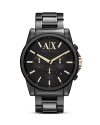 Armani Exchange crafts a classically styled statement with this plated metal watch. Crafted of stainless steel, it flaunts bold style with an eye-catching three eye chronograph.