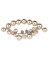 Make them blush. This half-stretch bracelet from Givenchy breathes sophistication with blush-colored glass pearls, silk glass stones and beaded accents. Crafted in imitation rhodium mixed metal. Approximate diameter: 2-1/8 inches.