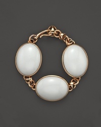 Statement making white agate stones are set in gleaming 18K rose gold on this stunning Di MODOLO bracelet.