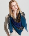 With a geometric print and contrast border, this Burberry square scarf is an edgy accent for work or weekend.