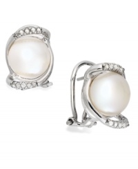 Capturing elegance. This sterling silver pair of stud earrings, with cultured freshwater button pearls (9-10 mm) and diamonds (1/10 ct. t.w.) embodies grace and style. Approximate length: 2-3/4 inches. Approximate width: 3/4 inch.