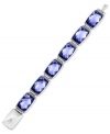 Discover bliss with Swarovski's Nirvana bracelet. It is crafted from rhodium-plated stainless steel with Tanzanite crystals inspiring tranquility. Approximate length: 8 inches.