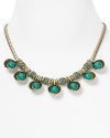 An instant wow piece. This Giles & Brother necklace flaunts edgy allure with sinuous chains, accented by seashell dangles.