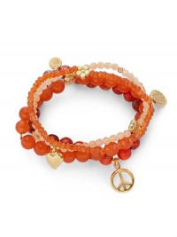 THE LOOKSet of four beaded braceletsPeace and love charmsJasper, jade and carnelian stones22k goldplated vermeil sterling silver charm accentsElastic pull-on styleTHE MEASUREMENTWidth, about 2.5ORIGINMade in USA of imported materials