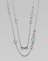 From the Infinity Collection. A long delicate sterling silver strand is accented with blue topaz stones.Blue topaz Sterling silver Length, about 46 Toggle clasp Imported