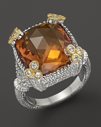 18K gold accents frame a faceted honey corundum stone on Judith Ripka's small Monaco ring.