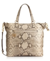 An absolute snake charmer, this posh python-embossed leather carryall from MICHAEL Michael Kors combines a spacious tote silhouette with slender straps and luxurious custom hardware in a alluring, elegant design.