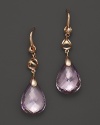 Showcasing faceted amethyst stones, Di MODOLO's signature Icona dangle earrings lend timeless sparkle.