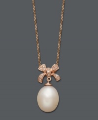 Perfectly feminine. This beautifully-crafted style highlights a cultured freshwater pearl drop (11-12 mm) accented by a sparking, diamond-encrusted ribbon. Setting and chain crafted in 14k rose gold. Approximate length: 17 inches. Approximate drop: 1 inch.