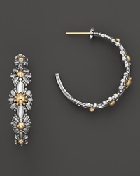 18K yellow gold and sterling silver blossoms form these pretty hoops from Konstantino.