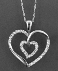 Let your love shine bright. This dazzling heart pendant features round-cut diamond (1/4 ct. t.w.) set in 14k white gold. Approximate length: 18 inches. Approximate drop: 1 inch.