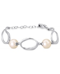 Understated elegance. This bracelet from Majorica is crafted from sterling silver with organic man-made pearls (10/12 mm) added for classic appeal. Approximate length: 7-1/2 inches.