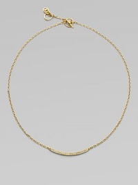 A delicate style featuring a curved bar encrusted in sparkling rhinestones on a link chain. Goldtone brassGlass stonesLength, about 16Toggle closureImported 