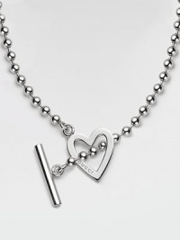 An open heart, etched with the Gucci name, on a bold ball chain with toggle closure, crafted of polished sterling silver. Sterling silver Chain length, about 16¼ Pendant length, about ¾ Toggle closure Made in Italy