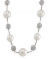 Carolee creates an icy illusion with this stunning necklace. Glass pearls and crystal-accented fireballs alternate on a chain crafted of imitation rhodium-plated mixed metal. Approximate length: 16 inches + 2-inch extender.