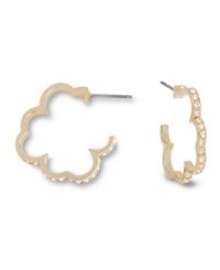 Inspired by the four leaf clover, this elegant pair of pierced earrings symbolizes good luck. The delicate gold tone mixed metal silhouette is embellished with a touch of clear Swarovski crystal pavé. Approximate diameter: 7/8 inch.