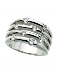 Get a chic, layered look with minimal effort. This effortlessly stylish ring by GUESS feature a four-row stacked design with eight round-cut crystal accents. Crafted in silver tone mixed metal. Size 7.