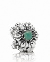 Birthstone accents add a personal touch to PANDORA's floral charm.