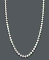 Pretty as a picture. Cultured freshwater pearls (5-6 mm) are arranged in a delicate strand necklace that is perfect for celebrating any child's milestone and is worth cherishing for years. Necklace set in brilliant 14k gold. Approximate length: 14 inches.