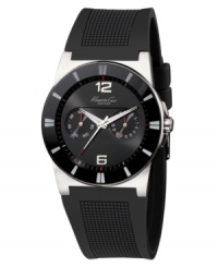 Modern, confident style by Kenneth Cole New York. This watch features a black polyurethane strap and stainless steel round case. Stick indices at bezel. Black dial with logo, numerals at twelve o'clock and six o'clock, and two subdials. Amalog movement. Water resistant to 30 meters. Limited lifetime warranty.