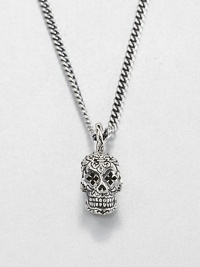 Sterling silver 'Small Day Of The Dead' skull pendant with intricately carved cross-shaped eyes suspends from a curb link chain with signature logo detail.Sterling silverLength about 24Lobster claspMade in USA