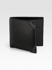 A simple bi-fold design receives a remarkably modern update, featuring six card slots and a billfold compartment, finished in textured, eel-embossed leather with silver accents.One billfold compartmentSix card slotsLeather5W x 4HImported