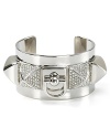 Rock a heavy metal: this Juicy Couture cuff works an edgy vibe, cast in plated metal with chunky stone accents.