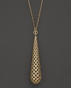 An intricate lattice design in 18K yellow gold lends an ornate look to Gucci's Diamantissima necklace.