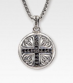 A sterling silver medallion is detailed with deep-relief Sparta engraving and a diamond-cut black sapphire cross. 1.36 tcw Medallion, about 1 dia Endless chain, 26 long Made in USA