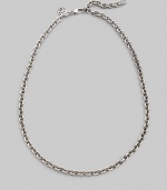 Simple and sophisticated, a bold chain of sterling silver with a signature tag at the clasp. Sterling silver Length, about 20 Lobster clasp Made in Bali