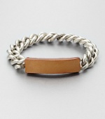 A distinctive blend of supple leather and sleek link chain. LeatherBrassDiameter, about 3Push clasp closureMade in Italy